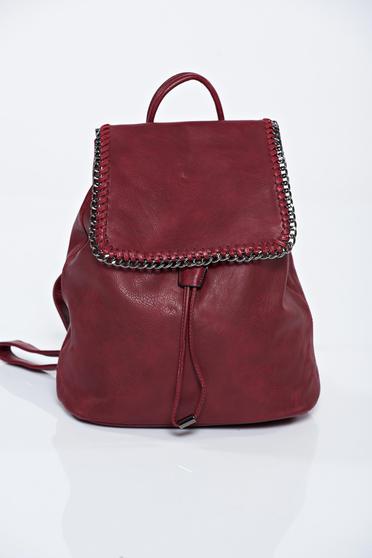 Burgundy ecological leather backpack accessorized with chain