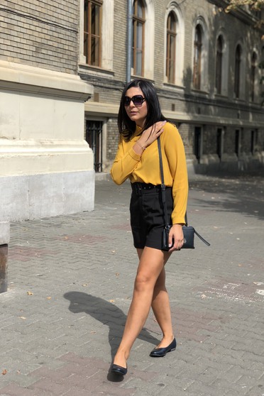 Elegant flared women`s shirt slightly transparent fabric mustard