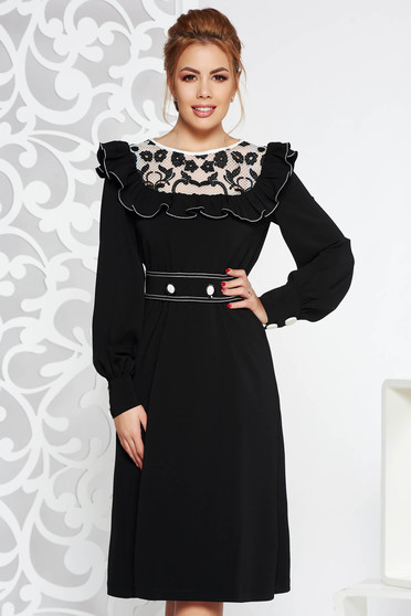 LaDonna black elegant dress from non elastic fabric with ruffle details with lace details accessorized with tied waistband