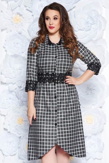 Black elegant midi dress from non elastic fabric with lace details accessorized with tied waistband