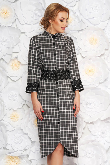 Black elegant midi dress from non elastic fabric with lace details accessorized with tied waistband