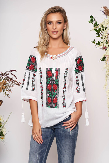 White embroidered women`s blouse cotton blouse flared long sleeved