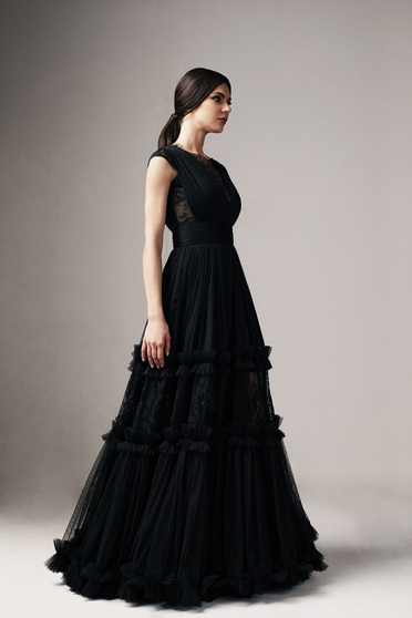 Ana Radu black occasional cloche dress with v-neckline with lace details accessorized with tied waistband