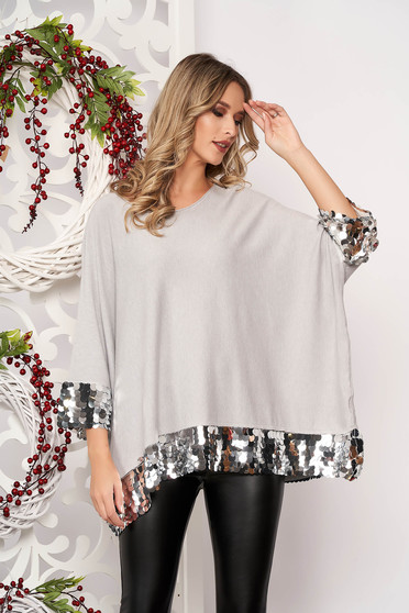 Grey women`s blouse with sequin embellished details short sleeves from elastic fabric with easy cut thin fabric short cut