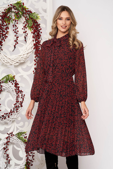 Red dress long sleeved flaring cut pleats of material from veil elastic waist