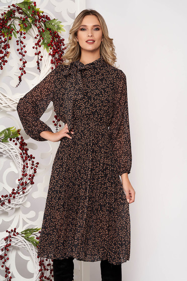 Brown dress long sleeved flaring cut pleats of material from veil elastic waist