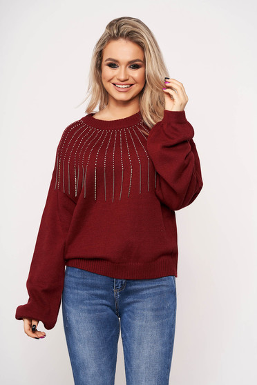 Burgundy sweater long sleeve with crystal embellished details with rounded cleavage accessorized with chain casual