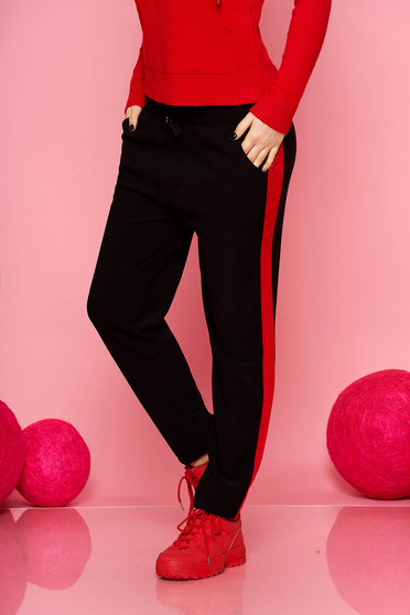 Red trousers casual with pockets with elastic waist is fastened around the waist with a ribbon straight