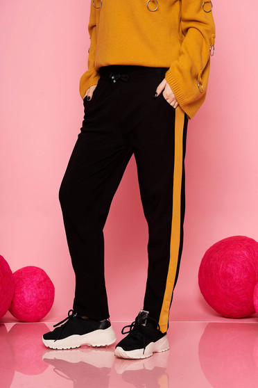 Mustard trousers casual with pockets with elastic waist is fastened around the waist with a ribbon straight
